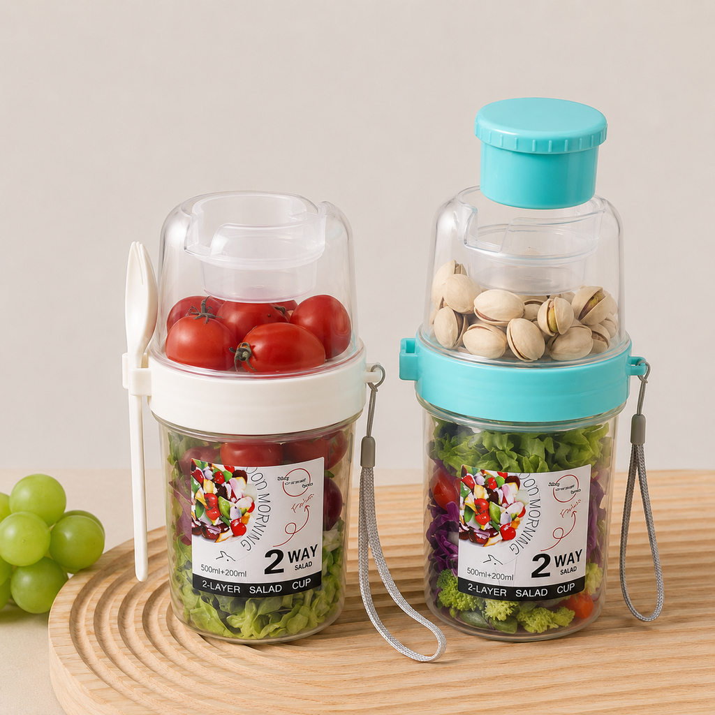 Bol à salade nomade avec compartiment à sauce et fourchette